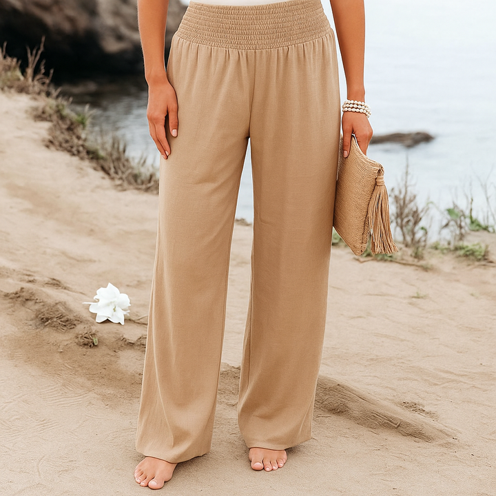 Fließende, weite Hose mit hoher Taille und elastischem Bund