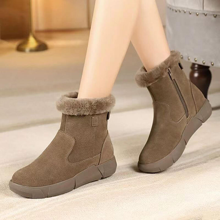 Mit Fell gefütterte Stiefeletten